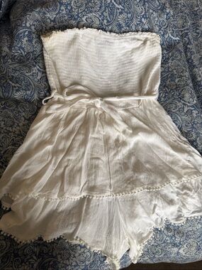 White Strapless Romper with Tie Waist and Pom Pom Trim